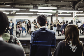 Image showing Passengers traveling by Tokyo metro.