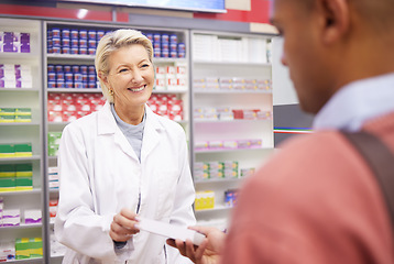 Image showing Service, consulting and pharmacist with medicine for a man for healthcare at a pharmacy. Medical, help and clinic woman giving a patient pills for an illness, flu or cold while working in health