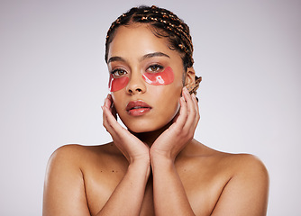 Image showing Black woman, eye mask and beauty portrait with skin care, cosmetics and dermatology in studio. Face of aesthetic model person on a grey background with facial collagen gel patch for wellness glow