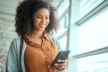 Image showing Black woman at airport, travel with phone and communication and check social media with smile on face. Notification, email or chat with technology, ready for flight and happy for adventure