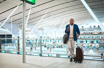 Image showing Black man standing in airport, smile and phone with online flight schedule or visa application for business trip. Global travel, technology and happy businessman checking international destination.