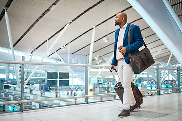 Image showing Travel, airport and bag with a business black man walking in a terminal for global success. Manager, mockup and flight with a male ceo in a terminus station for international work traveling