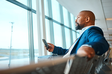 Image showing Travel, thinking and phone with black man in airport for social media, business trip and and networking. Communication, vacation and email with passenger on layover for first class, app and contact