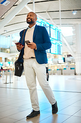 Image showing Black man walking in airport with phone and ticket, checking flight schedule in terminal and holding passport for business trip. Smile, travel and happy businessman boarding international destination