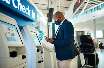 Image showing Black man, face mask and plane self check in with phone app with airport information for travel. International flight data, businessman and luggage of a employee reading mobile info for airplane