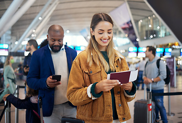 Image showing Travel, queue and ticket with woman in airport for vacation, international trip and tourism. Holiday, luggage and customs with passenger in line for airline, departure and flight transportation