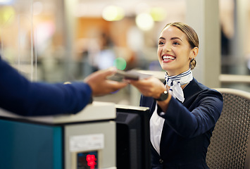 Image showing Woman, airport and passenger assistant with passport helping traveler for check in at terminal counter. Female service agent with smile in travel security or immigration documents for airline control