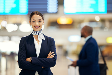 Image showing Woman, airport and service agent with arms crossed standing ready with smile in FAQ, help or direction. Portrait of happy female airline passenger assistant smiling for immigration or travel services