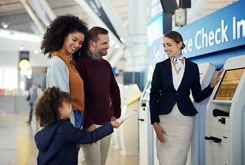 Image showing Woman, services agent and family at airport by self service check in station for information, help or FAQ. Happy female passenger assistant helping travelers register or book airline flight ticket