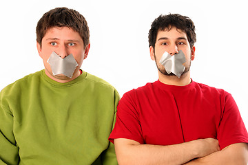 Image showing Two guys with adhesive tape