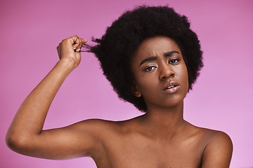Image showing Afro hair, portrait and confused black woman in studio for grooming or treatment on purple background. Face, haircare and girl model unhappy with tangle, knot or texture after beauty routine isolated