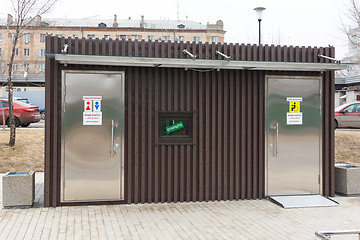 Image showing The building of a free street toilet with a cabin for the disabled