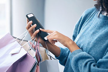 Image showing Shopping bag, black woman or hand with phone in mall for fashion sale, discount or luxury brand store. Search or girl on smartphone for social media, promo code or online retail website app news