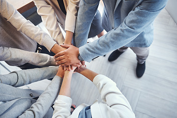 Image showing Diversity, stack of hands and business people in the office in unity, collaboration and teamwork. Multiracial, corporate and professional team with motivation, support and connection in the workplace