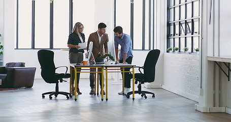 Image showing Business meeting, b2b and men and woman in office, planning project proposal and discussion at design agency. Corporate people, partnership and designer team, client sharing creative vision and idea.