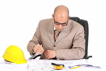 Image showing Businessman with architectural plans 