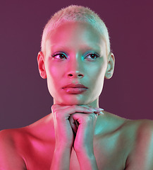 Image showing Neon beauty, art and woman with makeup and lights for creative skincare advertising on studio background. Cyberpunk, product placement and model isolated for skin care and futuristic mock up space.