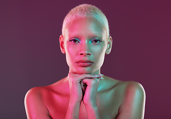 Image showing Skincare, beauty and portrait of woman with neon makeup and lights in creative advertising on studio background. Cyberpunk, product placement and model isolated for futuristic skin care mockup space.