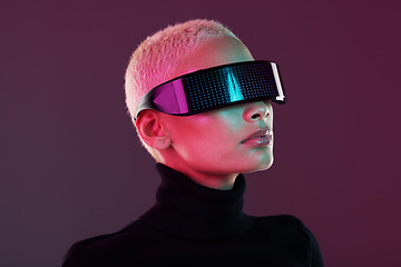 Image showing Vr glasses, woman and metaverse for futuristic gaming, digital transformation and tech. Cyberpunk person face on studio background with virtual or augmented reality headset for 3d and cyber world ux