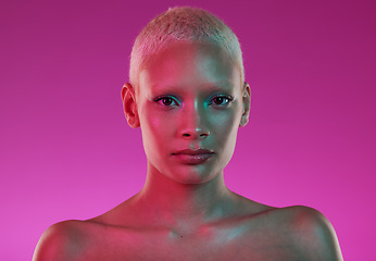 Image showing Skincare, beauty and woman with neon face makeup and lights for creative advertising on pink background. Cyberpunk, product placement and model isolated for skin care and futuristic mock up in studio