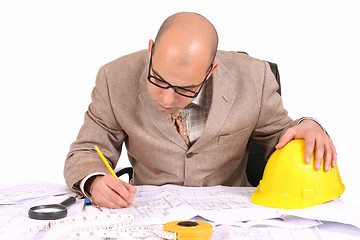 Image showing Businessman with architectural plans 