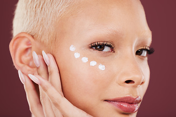 Image showing Skincare, beauty and portrait of woman with eye cream on face, cosmetics and luxury skin product on studio background. Dermatology, facial and model isolated with mock up, anti ageing care and glow