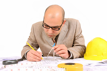 Image showing Businessman with architectural plans 