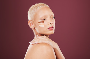 Image showing Makeup, foundation and face of woman with cosmetics products, beauty and contour on studio background. Cosmetology, luxury salon and girl with test lines for skin toner, shade and facial treatment