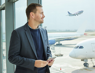 Image showing Business, window and man with passport, airport and excited for travel, thinking and international. Corporate, male leader and manager with ticket, check in and ready for flight, travelling and smile