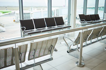 Image showing Background of empty airport, terminal lounge and chair furniture in waiting room. Airplane lobby, seat and space of commercial flight, clean building interior and global travel design for journey