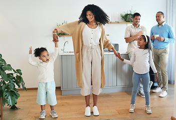 Image showing Happy, dance and relax with big family in kitchen for bonding, weekend and celebration fun. Wellness, music and playing with children and mother for dancing for happiness, affection and holiday