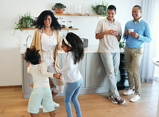 Image showing Smile, dance and jump with big family in kitchen for bonding, weekend and celebration fun. Wellness, music and playing with children and mother for dancing for happiness, affection and holiday