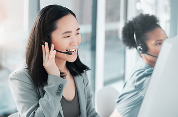 Image showing Call center, consulting and asian woman at computer in office for customer service, telemarketing and help desk. Happy, smile and contact us with consultant for technical support, advisory and sales