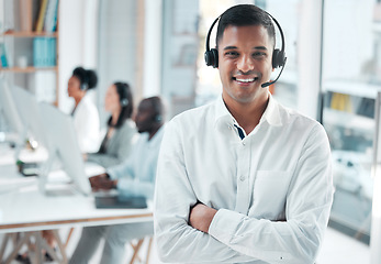 Image showing Crm, manager or portrait of man in call center smiles with pride, helping advice or networking online. Face, smile or happy Indian insurance agent in communication at customer services or sales job