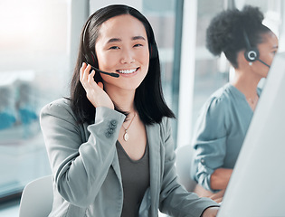 Image showing Call center, consulting and portrait of asian woman at computer for customer service, telemarketing and help desk. Happy, smile and contact us with consultant for technical support, advisory or sales