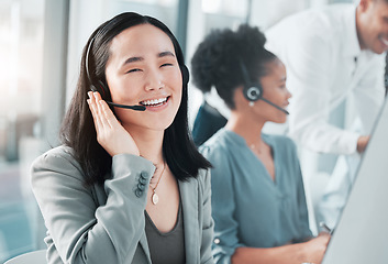Image showing Call center, smile and portrait of asian woman at computer for customer service, telemarketing and help desk. Happy, solution and contact us with consultant for technical support, advisory and sales