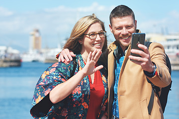 Image showing Video call, travel and couple with phone by harbor enjoy vacation, holiday and journey in Amsterdam. Dating, communication and happy man and woman on smartphone for social media, vlog and influencer