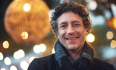 Image showing Night, mockup and portrait of a man in city with bokeh, lights and blurred background. Happy and handsome face, mature male and traveller relax in Italy for fun, festival and break, trip and smile