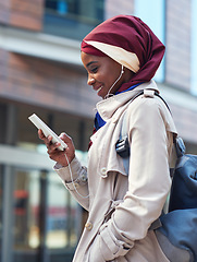 Image showing Smile, phone or travel black woman in city typing and walking, networking or on 5g mobile app in New York. Independent professional in the street on smartphone for communication or commute to office