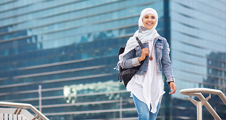 Image showing Happy muslim and woman in city for travel, goal and future career against building in Dubai with mockup. Islamic, smile and girl student for intern, program or experience with vision or mindset