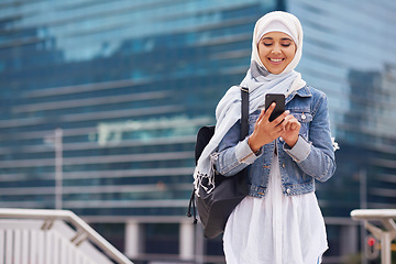 Image showing Travel, location and muslim woman in a city online for gps, map and navigation against building. Islamic, smartphone and independent girl student online in Dubai, app and taxi with mockup space