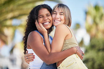 Image showing Portrait, friends and hug outdoors for travel, vacation and summer holiday against blurred background. Face, happy and women embrace on a trip in Miami, smile and relax while on an adventure together