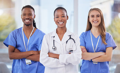 Image showing Doctors team, arms crossed and portrait at hospital with teamwork, diversity and solidarity for healthcare. Nurse, black man and women leader for student internship, and collaboration for wellness