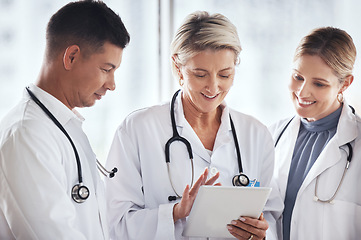 Image showing Healthcare, teamwork and doctors on tablet in hospital for online consulting, medical care and research. Health workers with digital tech for insurance form, telehealth and patient results in clinic