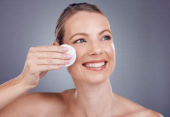 Image showing Cotton swab, skincare and face of woman on gray background for wellness, cosmetics and facial treatment. Beauty, dermatology and happy girl with pads for makeup removal, spa products and cleaning