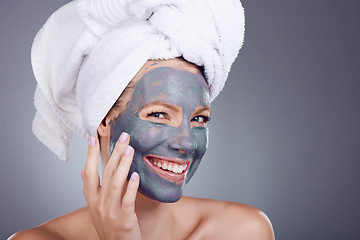 Image showing Woman, clay makeup and mask portrait for facial, detox beauty and studio background. Happy female model, charcoal skincare product and face cosmetics for cleaning, shower and aesthetic transformation