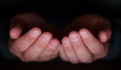 Image showing Hands together, open palm and dark for donation, giving or nonprofit mockup space for religion charity work. Hand sign, mock up and pray for worship, gratitude or mindfulness in night at ngo workpace