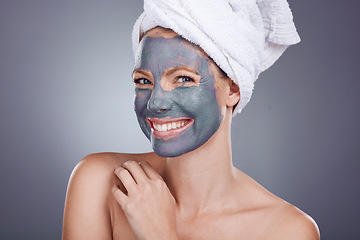 Image showing Clay, makeup and woman with mask for portrait facial, healthy beauty spa and studio background. Happy female model, charcoal skincare product and face cosmetics for acne, shower or aesthetic wellness