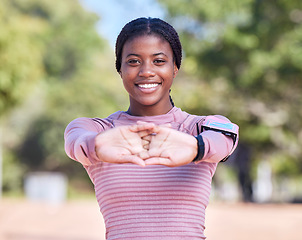 Image showing Fitness stretching, runner hands and portrait of black woman with a smile outdoor ready for running and race. Marathon training, sport and young person with blurred background with happiness from run