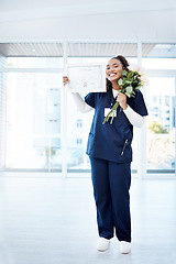 Image showing Nursing, celebration and black woman graduate with smile, flowers and ADN certificate at hospital. Healthcare, education and nurse at graduation, happy scholarship qualification and academic award.